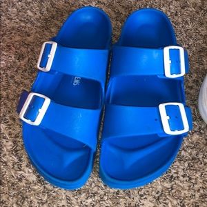 blue plastic birkenstock’s